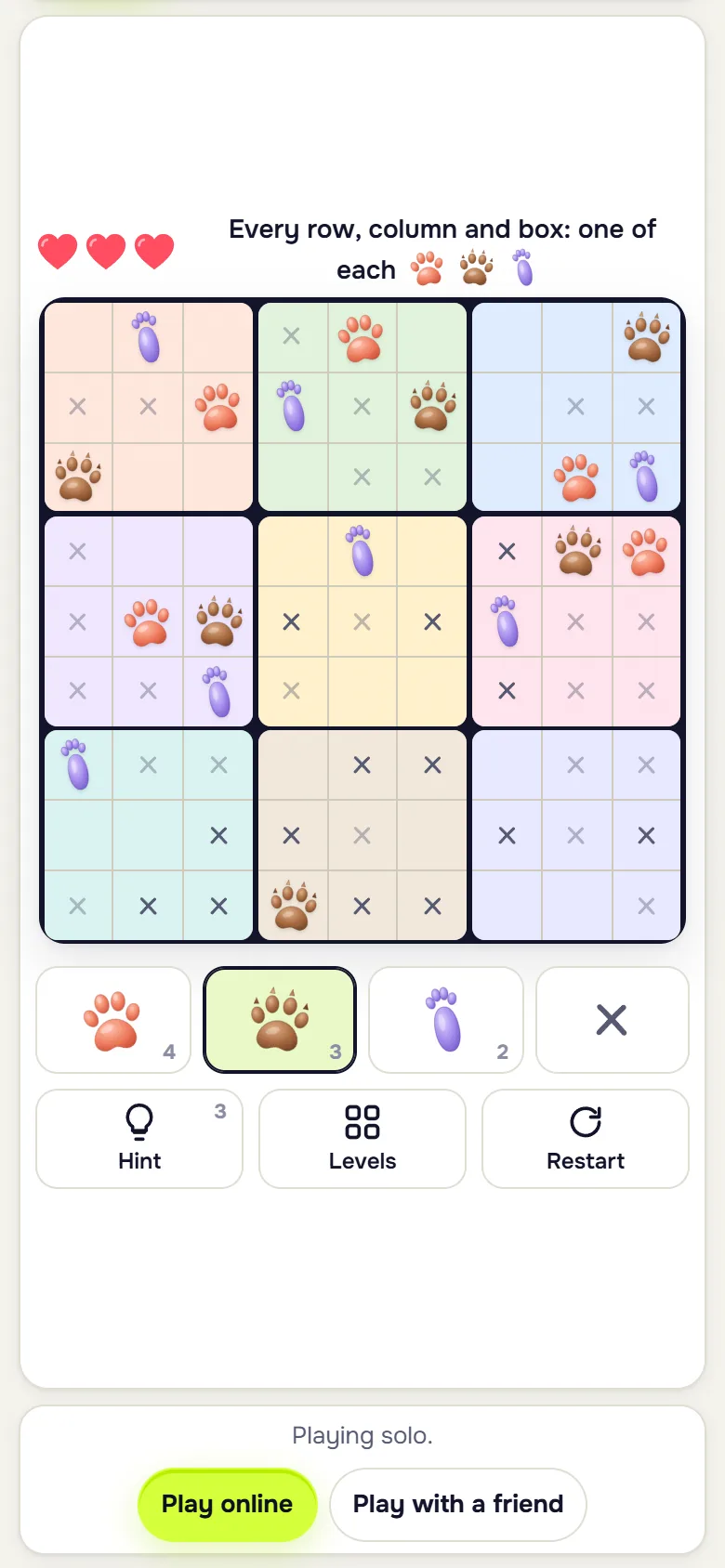 Cute Paws Sudoku board with paw prints and X marks in colored boxes on a phone